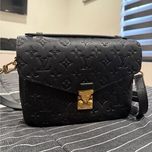 Louis Vuitton Black Crossbody Bag with Gold Hardware and Textured Leather